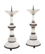 A pair of Continental rock crystal and metal mounted pricket candlesticks in...  A pair of