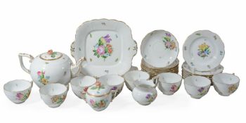 A modern Herend part tea service painted with flower-sprays within...  A modern Herend part tea