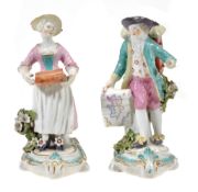 A pair of Derby models of a map seller and companion, circa 1770, 16cm high  A pair of Derby models