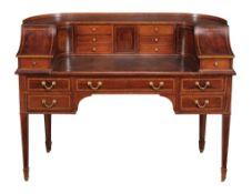 An Edwardian inlaid mahogany Carlton House desk, circa 1905  An Edwardian inlaid mahogany Carlton