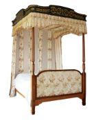 A George III mahogany, ebonised and parcel gilt four post bed, circa 1810  A George III mahogany,