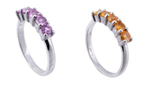 Two sapphire rings, the first ring claw set with round cut pink sapphires  Two sapphire rings,   the