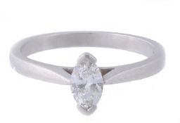 A diamond ring, set with a marquise shaped diamond, estimated to weigh 0  A diamond ring,   set with