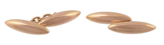 A pair of gold coloured torpedo cufflinks  A pair of gold coloured torpedo cufflinks,   the polished