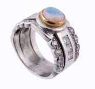 A diamond and opal dress ring, the broad panel with a central circular...  A diamond and opal