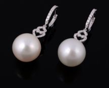 A pair of white South Sea cultured pearl and diamond earrings , the 15  A pair of white South Sea