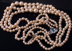 A cultured pearl necklace to a diamond and aquamarine set clasp  A cultured pearl necklace to a
