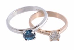 A single stone diamond ring , the brilliant cut diamond in a four claw setting  A single stone