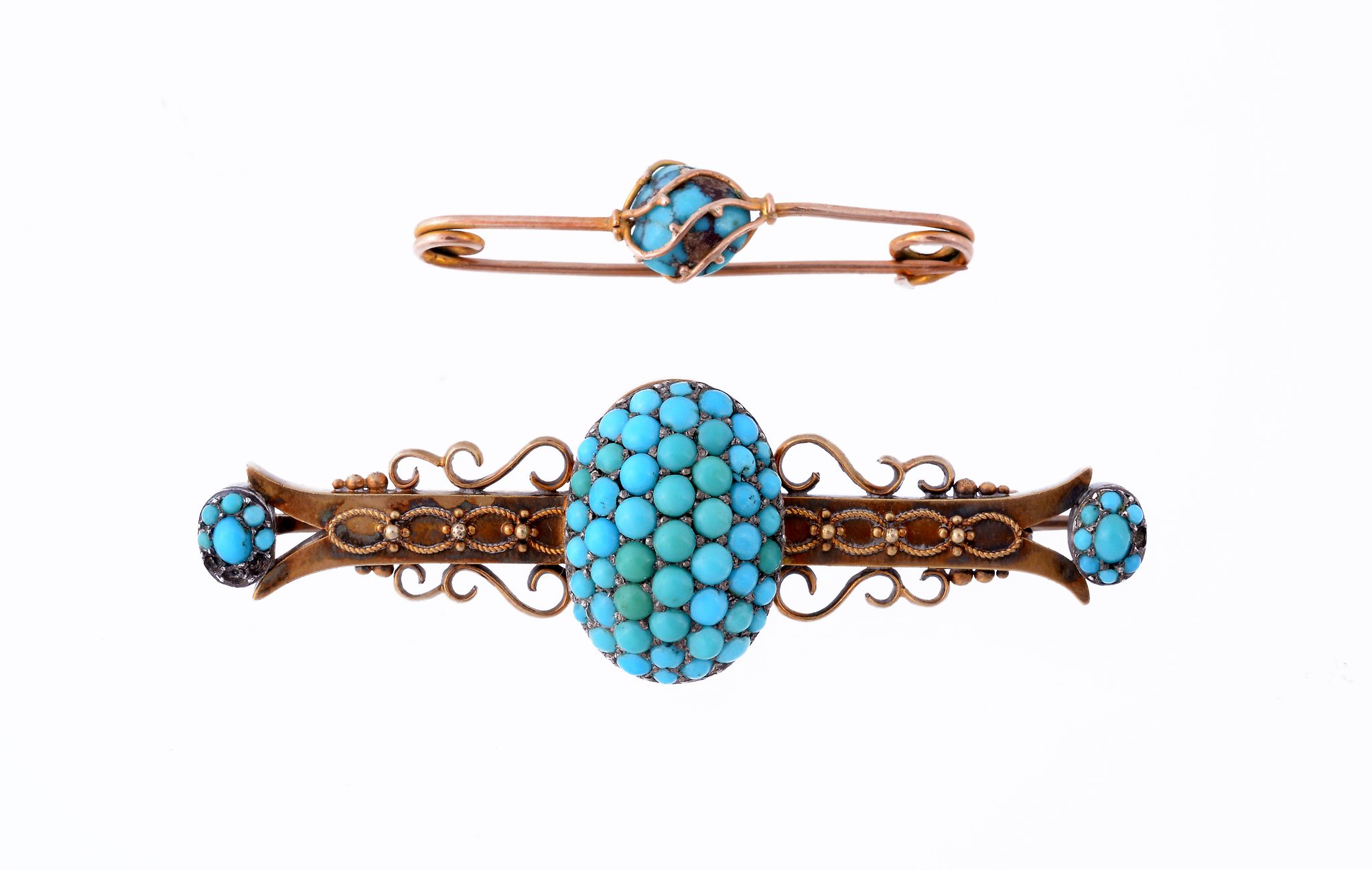 A Victorian turquoise set bar brooch , circa 1870  A Victorian turquoise set bar brooch  , circa