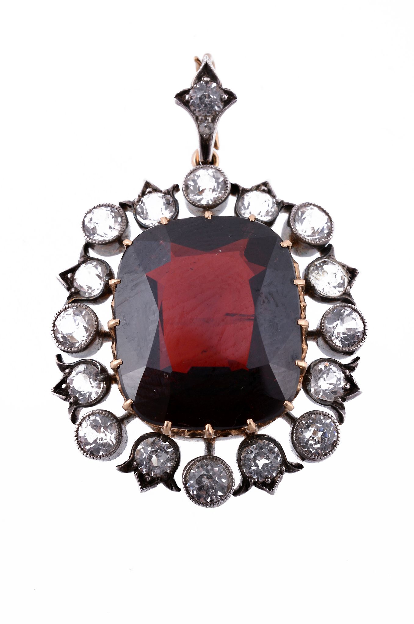 A late Victorian garnet and white sapphire pendant , circa 1890  A late Victorian garnet and white