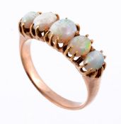 An opal ring, the five graduating opals in claw settings  An opal ring,   the five graduating