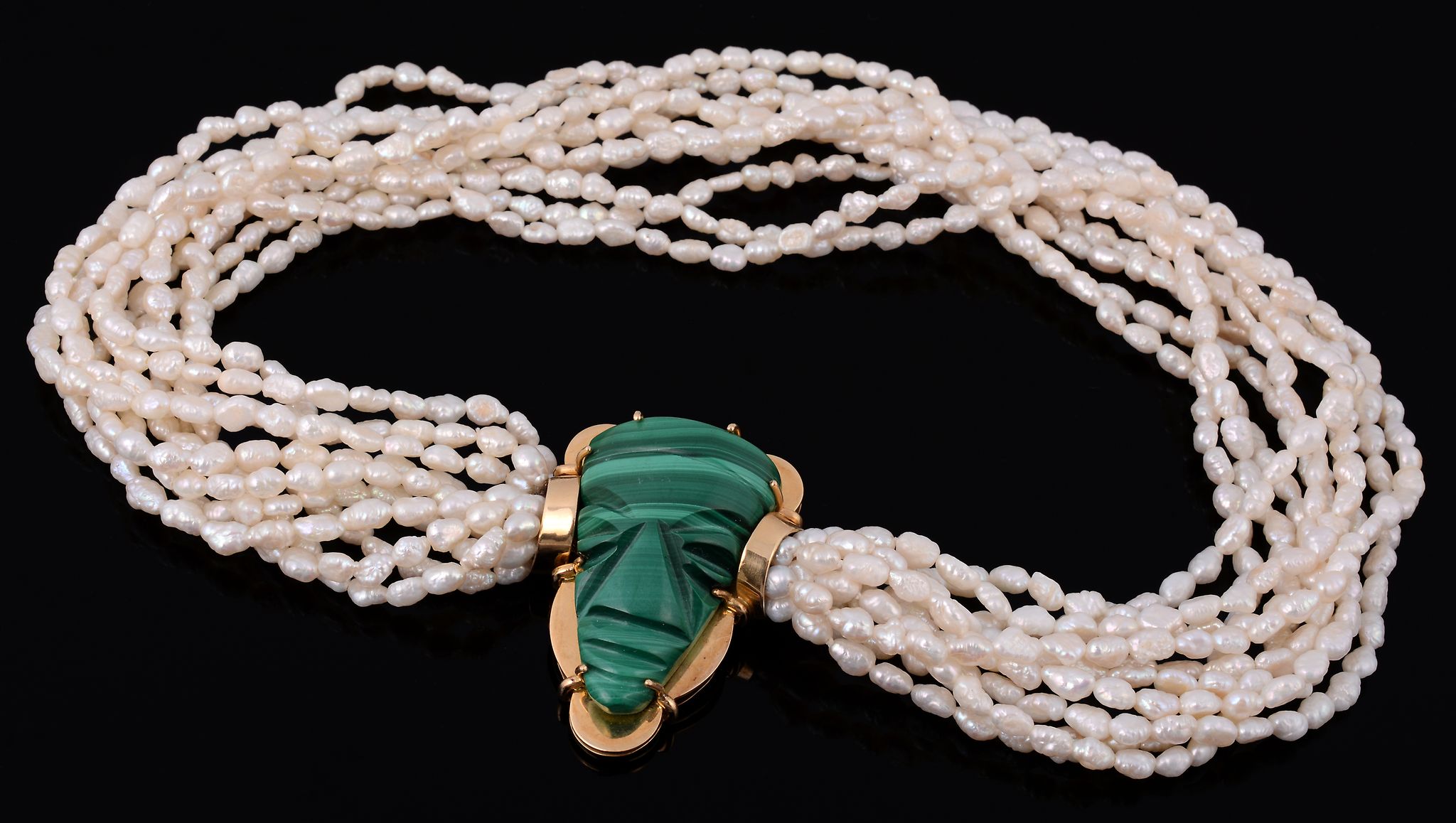 A freshwater cultured pearl and malachite necklace  A freshwater cultured pearl and malachite