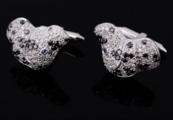 A pair of diamond and black diamond dalmation cufflinks  A pair of diamond and black diamond