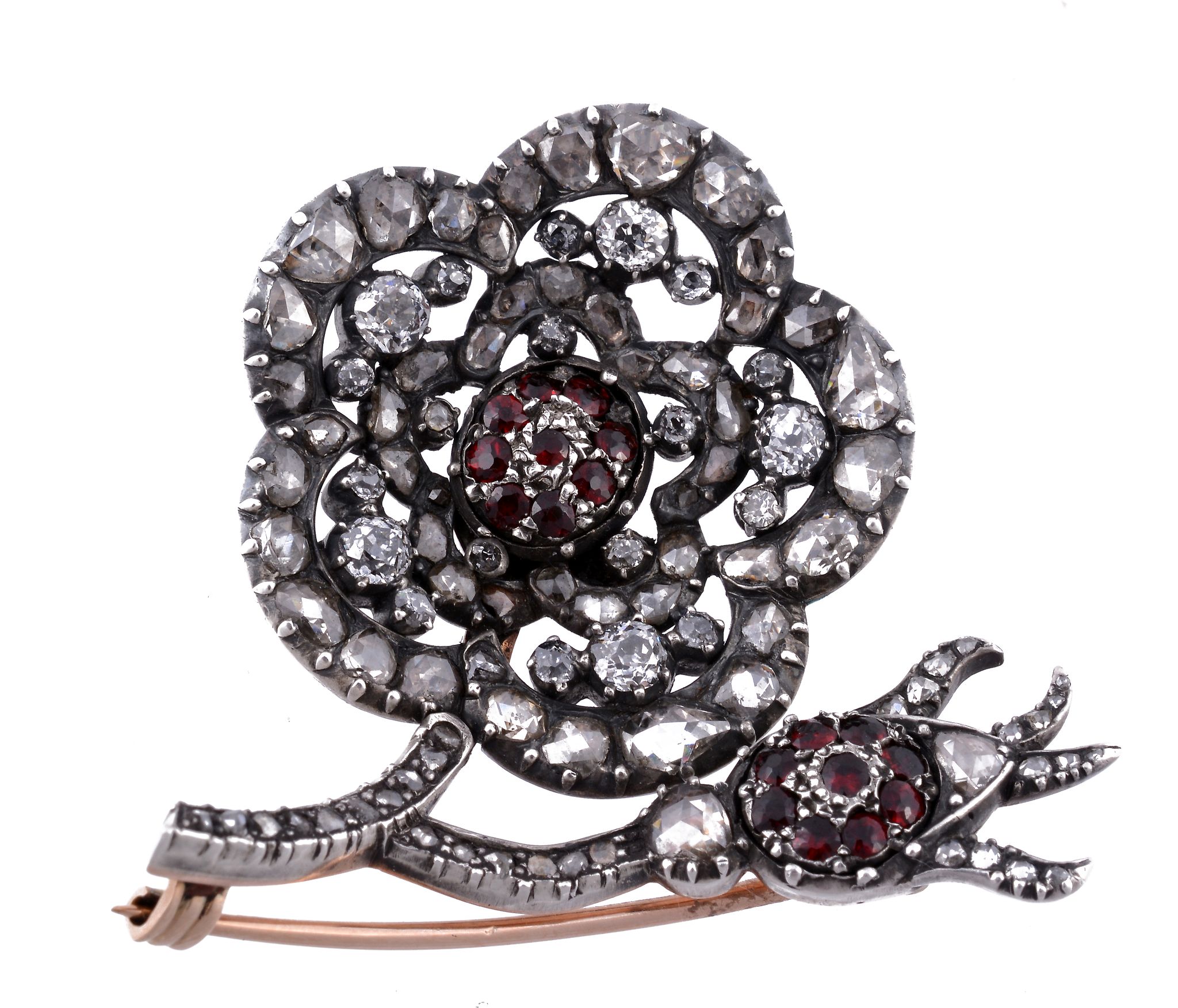 A late 19th Century diamond and garnet flower head brooch, circa 1880  A late 19th Century diamond