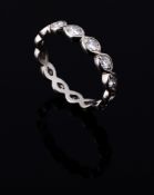 A diamond eternity ring , the ring with pear shaped panels each set with a...  A diamond eternity