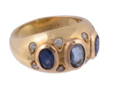 A sapphire and white stone dress ring, the oval cut sapphires in collet...  A sapphire and white