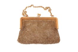 A French gold coin purse, circa 1900, the chain link pouch with two...  A French gold coin