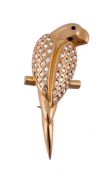A diamond parrot brooch, the parrot set with brilliant cut diamonds to the...  A diamond parrot