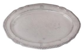 A George III silver shaped oval meat plate by John Wakelin & William Taylor, London 1789, with a