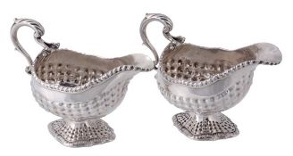 A pair of early George III silver oval sauce boats by William & James Priest, London 1764, with