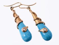 A pair of reconstituted turquoise and diamond snake ear pendents, the polished reconstituted