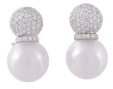A pair of South Sea cultured pearl and diamond ear clips, the bombe pave set brilliant cut diamond p