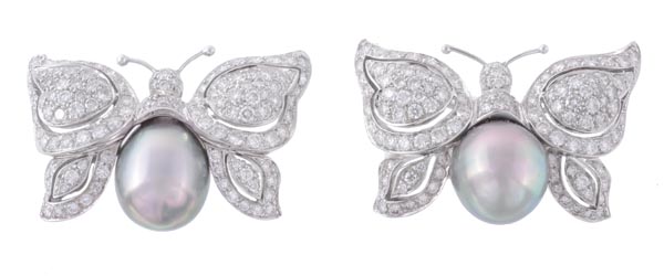 A pair of South Sea cultured pearl and diamond butterfly brooches, the 12mm South Sea cultured