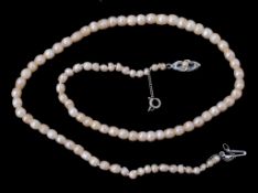Please note the description should read; A natural pearl necklace, the ninety two graduated pearls