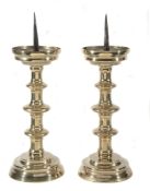 A fine pair of brass pricket candlesticks