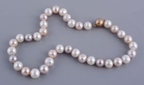 A pink and white freshwater cultured pearl necklace  A pink and white freshwater cultured pearl