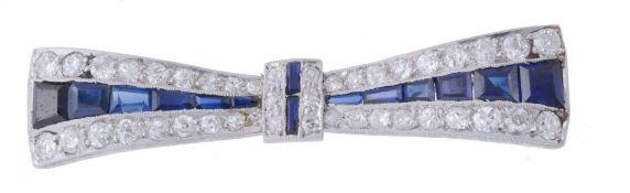 An Art Deco diamond and synthetic sapphire bow brooch, circa 1930  An Art Deco diamond and
