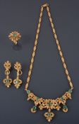 An emerald and diamond foliate suite, the necklace with diamond set pierced...  An emerald and