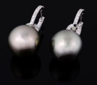 A pair of black South Sea cultured pearl and diamond earrings, the 14  A pair of black South Sea