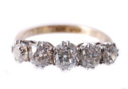 A diamond five stone ring, set with graduating old brilliant cut diamonds  A diamond five stone