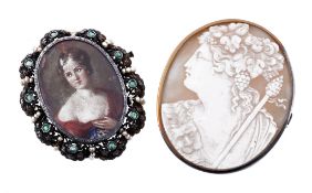 A mid 19th century emerald and seed pearl set portrait miniature brooch  A mid 19th century emerald