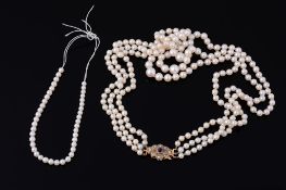 A three row cultured pearl necklace, the graduated pearls to a half pearl...  A three row cultured