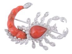 A coral and diamond scorpion brooch, the scorpion with a pear shaped coral...  A coral and diamond