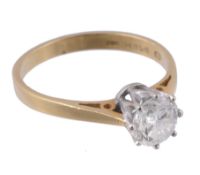 An 18 carat gold diamond single stone ring, the brilliant cut diamond  An 18 carat gold diamond