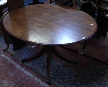 A Regency mahogany oval pedestal table 132cm wide