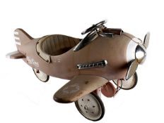 An AIRFLOW COLLECTABLE Sky King pedal aeroplane in 1950`s style, pale pink body work and chromium
