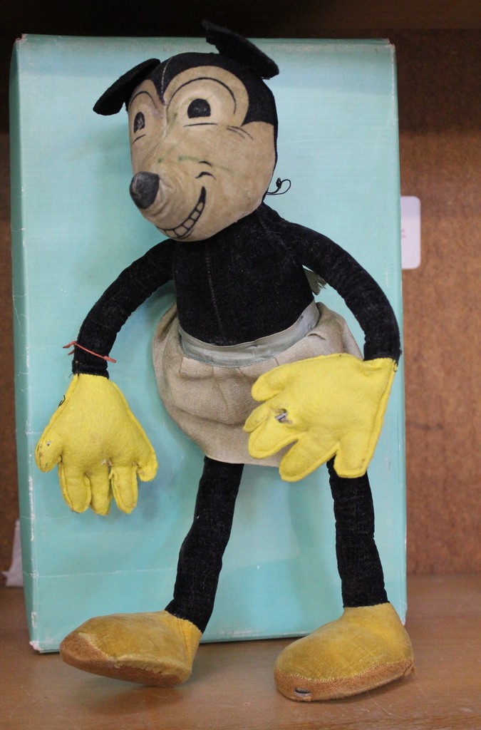 A felt Minnie Mouse, circa 1930s, with wired articulated arms and legs, 34cm approx.