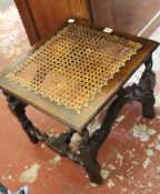 A carved oak and caned stool incorporating 17th Century elements