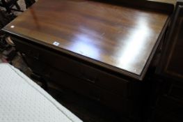A George III style mahogany chest of drawers on short carved cabriole legs