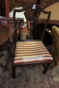 A Victorian walnut nursing chair and a Hepplewhite style elbow chair