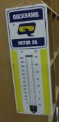 A Duckhams enamel motor oil sign with thermometer, 92cm high x 33cm wide