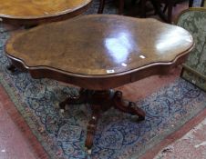 A Victorian walnut and burr walnut centre table, the crossbanded cartouche shaped top above a turned