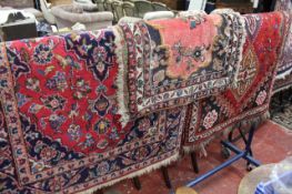 A Tabriz style rug 99 x 151cm, a Quashquai 155 x 86 and a further rug