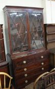 A Late 18th/ early 19th century mahogany secretaire bookcase with glazed upper section over