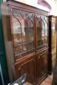 A mahogany china cabinet with glazed upper section with cupboards below.212cm h x 138cm w. Best Bid