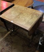 A Regency style walnut and crossbanded sofa table and a 19th century mahogany dropside table